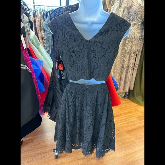 Two piece black lace short dress. Dress is brand new with tags attached size 4. - Picture 2 of 3